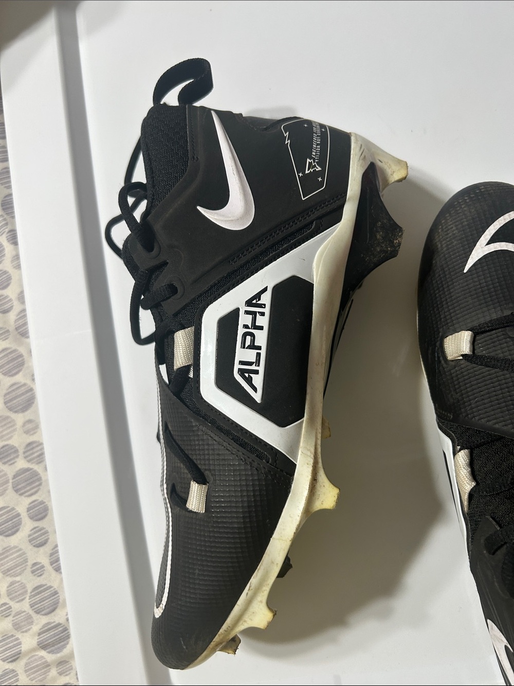 Nike Alpha Men's Black and White Athletic Cleats